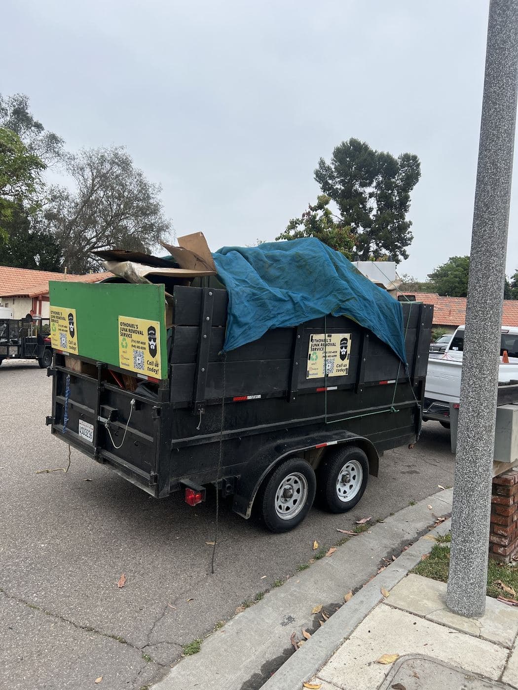 Othoniel's Junk Removal trailer loaded and ready for the dump run